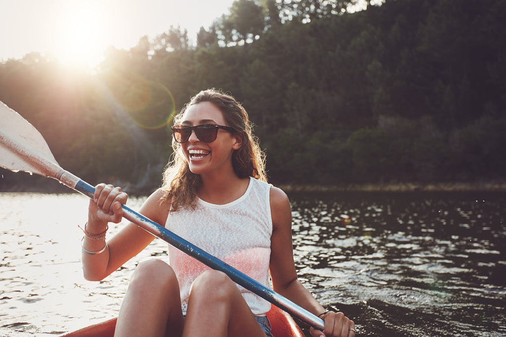 women paddling