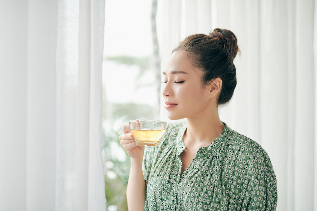 woman enjoying tea